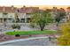 Backyard view showing green space surrounded by desert landscaping at 5501 Painted Sunrise Dr, Las Vegas, NV 89149