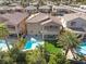 Aerial view of a home with a backyard oasis featuring a sparkling pool and lush landscaping at 5578 Holcomb Bridge Ct, Las Vegas, NV 89149