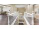 Bright upstairs loft with white banister overlooking the staircase at 5578 Holcomb Bridge Ct, Las Vegas, NV 89149