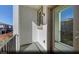 A well-designed private balcony showcases neighborhood views at 5733 Crenellated St # Lot 67, Las Vegas, NV 89148
