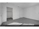 Spacious bedroom with a closet and neutral carpet, offering a blank canvas for personalization at 5733 Crenellated St # Lot 67, Las Vegas, NV 89148
