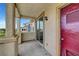 Outdoor balcony with stucco columns provides a tranquil setting, offering a glimpse of the neighborhood at 5829 Feral Garden St, North Las Vegas, NV 89031