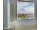 Bright bathroom featuring tile backsplash and a window with community views at 5829 Feral Garden St, North Las Vegas, NV 89031