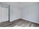 Clean bedroom with contemporary flooring, and a closet with sliding doors at 5829 Feral Garden St, North Las Vegas, NV 89031