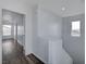 Hallway with stairs and a contemporary design at 5829 Feral Garden St, North Las Vegas, NV 89031