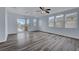 Bright living room featuring a balcony and lots of natural light at 5829 Feral Garden St, North Las Vegas, NV 89031