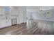 Bright, open-concept living space featuring sleek floors and modern kitchen appliances at 5829 Feral Garden St, North Las Vegas, NV 89031