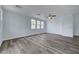 Bright living room featuring three windows and plenty of open space at 5829 Feral Garden St, North Las Vegas, NV 89031