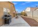 Backyard area featuring a grill and fire pit at 6037 Soft Springs Ave, Las Vegas, NV 89130