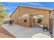 Spacious backyard featuring a concrete patio, grill, and fire pit at 6037 Soft Springs Ave, Las Vegas, NV 89130