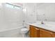 Bathroom featuring a shower-tub combo with white cabinets at 6037 Soft Springs Ave, Las Vegas, NV 89130