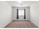 Bedroom featuring a window, neutral carpet, and walls ready for personalization at 6037 Soft Springs Ave, Las Vegas, NV 89130