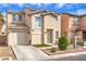 Attractive two-story home with garage and low maintenance front yard at 6066 El Sol Dr, Las Vegas, NV 89142