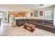 Open-concept living room featuring tile floors, neutral walls, and a spacious seating area at 6066 El Sol Dr, Las Vegas, NV 89142