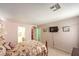 Bedroom with carpet flooring, a tv, walk in closet and ensuite bathroom at 6066 El Sol Dr, Las Vegas, NV 89142