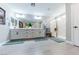 Modern bathroom features double vanity, a glass-enclosed shower, and sleek finishes throughout at 618 Steep Canyon Ave, Las Vegas, NV 89183