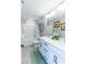 Bright bathroom featuring a double sink vanity, shower-tub combo, and stylish decor at 618 Steep Canyon Ave, Las Vegas, NV 89183