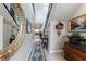 Elegant hallway featuring stylish decor and leading to the open-concept living area at 618 Steep Canyon Ave, Las Vegas, NV 89183