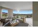 Relaxing balcony area with comfortable seating and stunning views of the city and mountains at 629 Majestic Rim Dr, Henderson, NV 89012