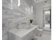 Contemporary bathroom with a sleek floating vanity, modern fixtures, and minimalist design at 629 Majestic Rim Dr, Henderson, NV 89012