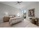 Inviting bedroom with natural light, stylish furnishings, and a cozy seating area at 629 Majestic Rim Dr, Henderson, NV 89012
