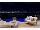 Stunning night cityscape view from the patio, enhancing outdoor living and entertainment at 629 Majestic Rim Dr, Henderson, NV 89012