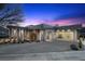 Stunning modern home with desert landscaping and ample parking space at 629 Majestic Rim Dr, Henderson, NV 89012