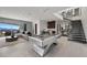 Entertainment area with a pool table, bar, and comfortable seating, perfect for relaxation and recreation at 629 Majestic Rim Dr, Henderson, NV 89012