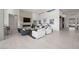 Spacious living room boasts high ceilings, stylish decor, fireplace, and seamless indoor-outdoor flow at 629 Majestic Rim Dr, Henderson, NV 89012