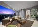 Spacious outdoor patio with comfortable seating and views into bedroom at 629 Majestic Rim Dr, Henderson, NV 89012