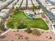 Large community park with green space, playground, picnic area, and community pool at 6325 Snap Ridge St # 102, North Las Vegas, NV 89081