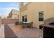 Private outdoor patio for dining with a grill at 6325 Snap Ridge St # 102, North Las Vegas, NV 89081
