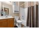 Bathroom featuring vanity, toilet, tub and tiled floor at 6325 Snap Ridge St # 102, North Las Vegas, NV 89081