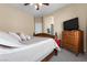 Comfortable bedroom boasts neutral walls and carpeting at 6325 Snap Ridge St # 102, North Las Vegas, NV 89081