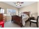 Cozy bedroom features neutral walls, carpet, and a window with neighborhood views at 6325 Snap Ridge St # 102, North Las Vegas, NV 89081