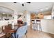 Eat-in kitchen and dining area with tile floors and a view into the living space at 6325 Snap Ridge St # 102, North Las Vegas, NV 89081