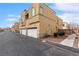 Charming condo featuring a two-car garage and neat landscaping at 6325 Snap Ridge St # 102, North Las Vegas, NV 89081