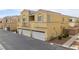 Attractive condo with a two-car garage and desert landscaping at 6325 Snap Ridge St # 3, North Las Vegas, NV 89081