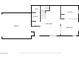 First-floor floor plan with a garage, laundry area, open living room, dining area, and kitchen layout at 6325 Snap Ridge St # 102, North Las Vegas, NV 89081