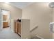 Upstairs hallway featuring linen closet with an adjacent full bathroom at 6325 Snap Ridge St # 102, North Las Vegas, NV 89081