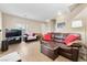 Spacious living room with neutral tile flooring and ample natural light at 6325 Snap Ridge St # 102, North Las Vegas, NV 89081