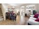 Cozy living room with comfortable seating, tile flooring, and a neutral color scheme at 6325 Snap Ridge St # 102, North Las Vegas, NV 89081
