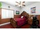 Cozy bedroom with wood accents and natural light at 6578 Chimes Tower Ave, Las Vegas, NV 89139