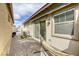 Enclosed backyard featuring a brick-paved area perfect for outdoor seating and relaxation at 762 Lilac Oak St, Henderson, NV 89011