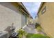 Backyard view with stone water feature, pavers, and a hammock at 762 Lilac Oak St, Henderson, NV 89011