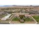 Stunning aerial view of community center with lush landscaping, pool, and desert views at 762 Lilac Oak St, Henderson, NV 89011
