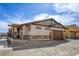 Lovely home exterior with a brick driveway, attractive landscaping, and inviting curb appeal at 762 Lilac Oak St, Henderson, NV 89011
