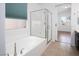 Relaxing bathroom with tub and separate shower at 7664 Mallard Bay Ave, Las Vegas, NV 89179