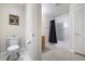 Clean, well-lit bathroom featuring a shower-tub combo with tile surround, vanity, and toilet at 8646 Mesquite Hills St, Las Vegas, NV 89139