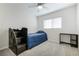 Carpeted bedroom with desk at 8646 Mesquite Hills St, Las Vegas, NV 89139